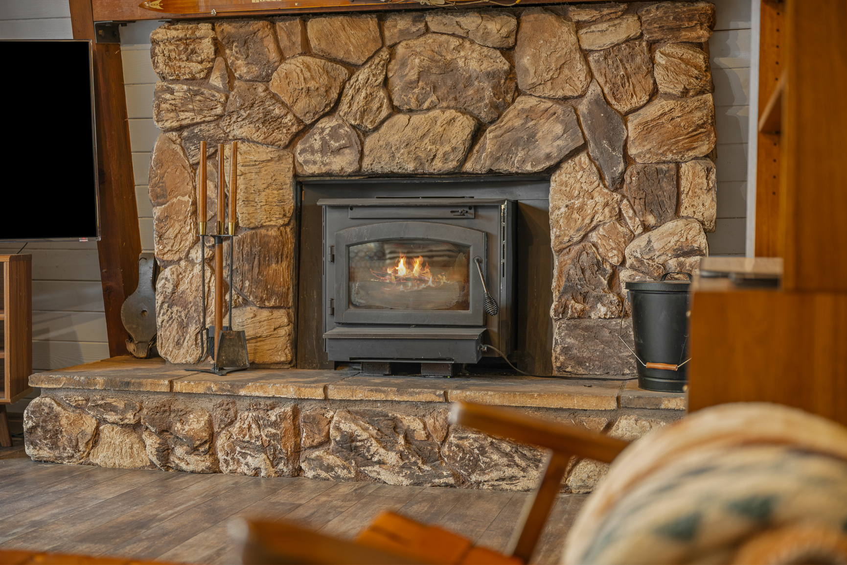 Stone wood-burning fireplace